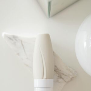 White Plastic Bottle on White Table